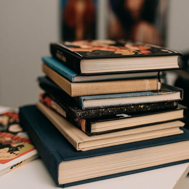 Lukeni books, stack of hardcover books